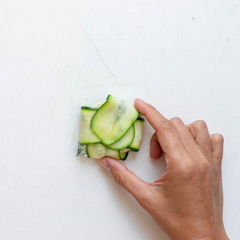 One zucchini ravioli fully folded together.