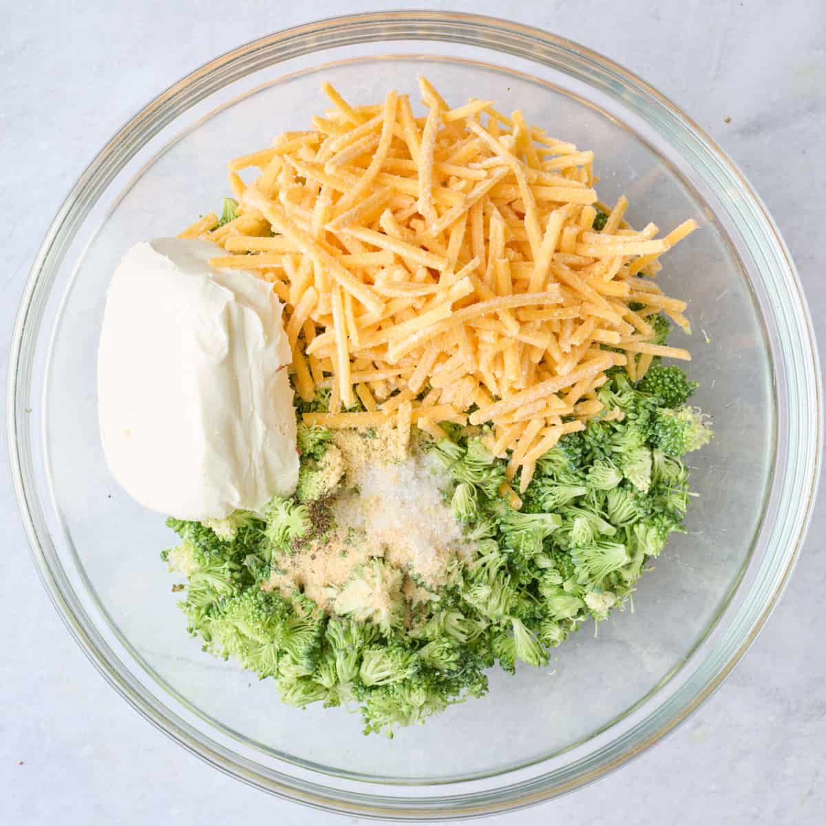 Broccoli, cheese, cream cheese, garlic and mustard powders, salt and pepper in a small bowl before combining.