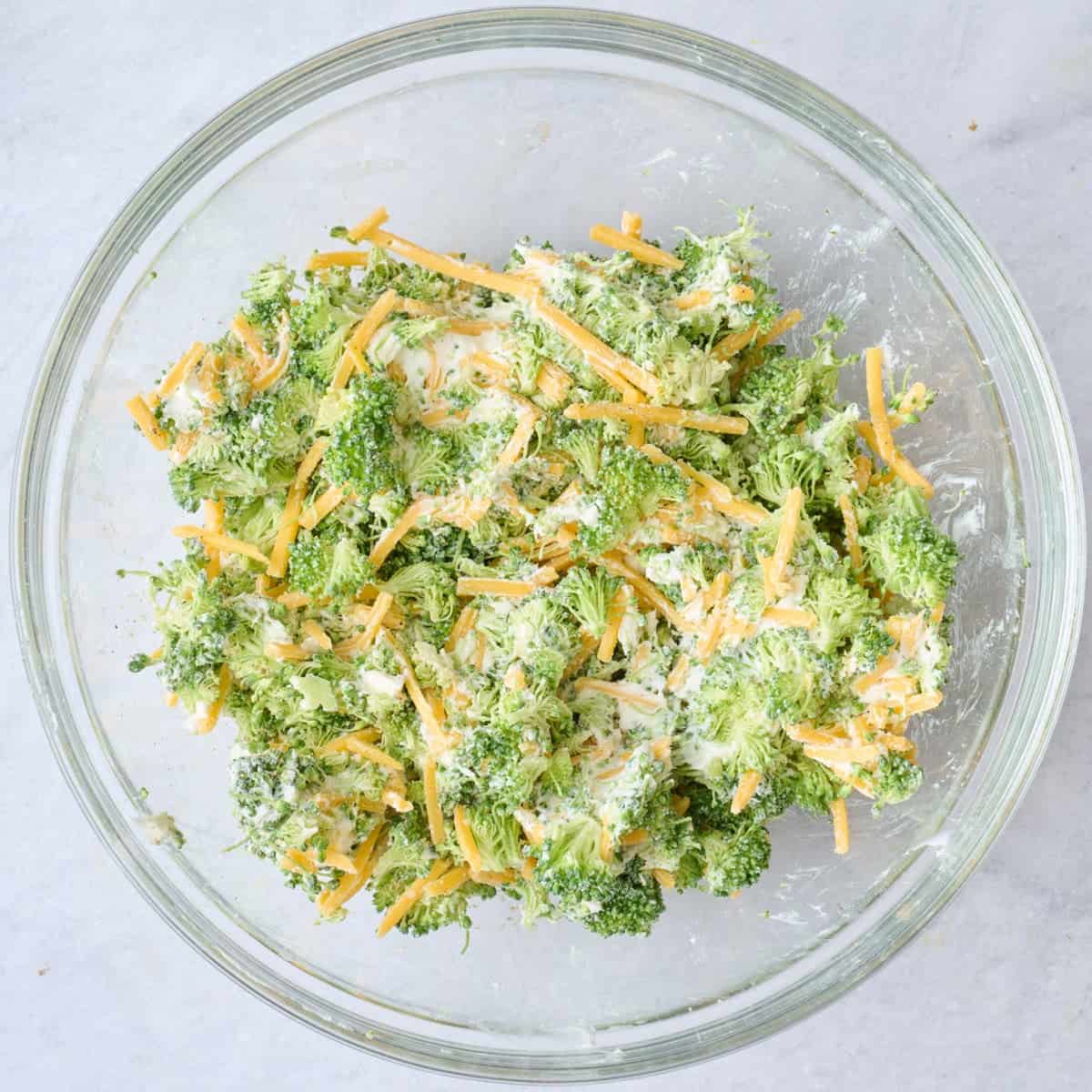 Broccoli, cheese, cream cheese, garlic and mustard powders, salt and pepper in a small bowl after combining.