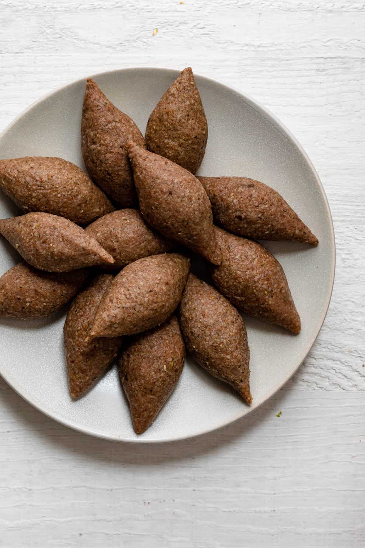 Raw kibbeh balls before frying