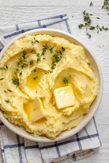 Final instant pot mashed potatoes served with extra butter