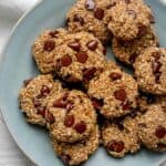 Banana oatmeal cookies on a plate with chocolate chips