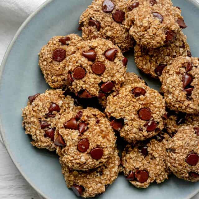 Banana oatmeal cookies on a plate with chocolate chips