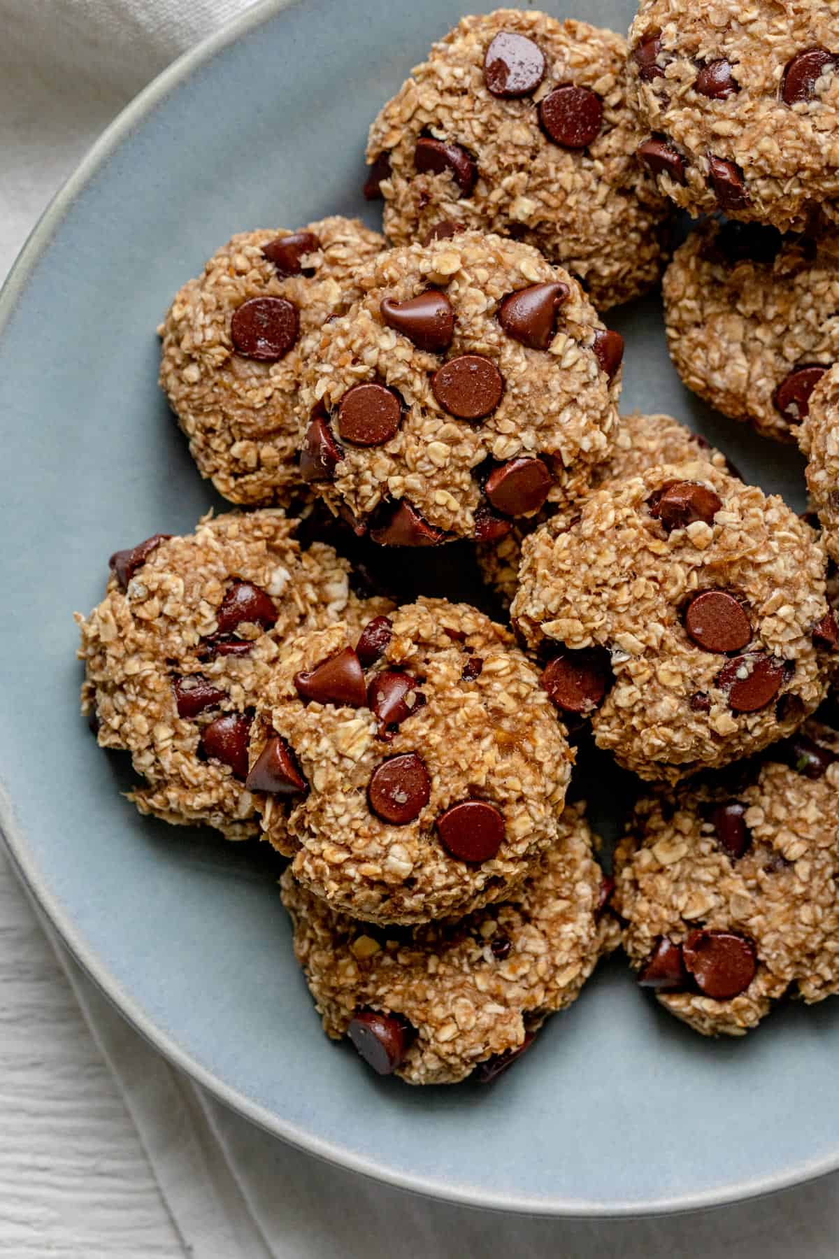 Banana oatmeal cookies after baking on a blue plate