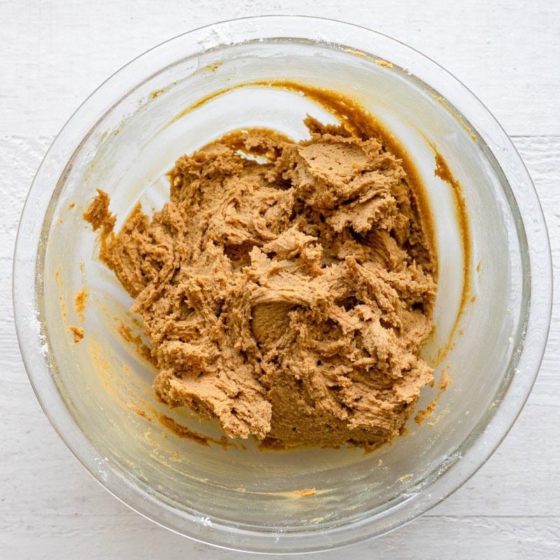 After slowly adding dry ingredients into the cookie batter.