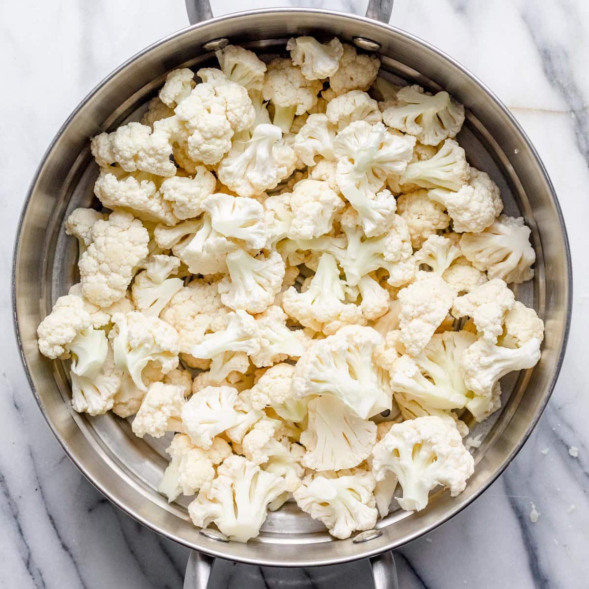 Cauliflower in a pot of water.
