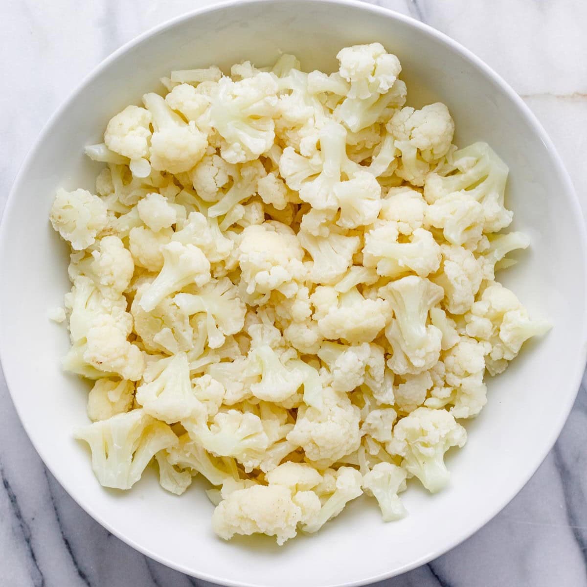 Cooked cauliflower in a bowl.