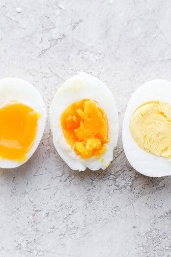 Three halves of boiled eggs laid out.