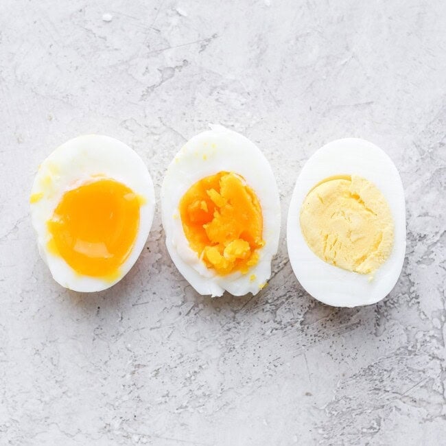 Three halves of boiled eggs laid out.