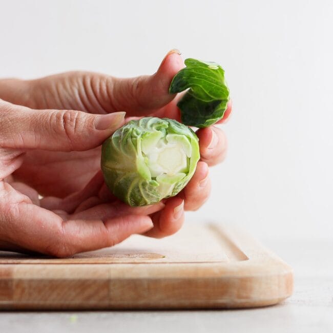 Removing yellowish outer leaves or wilted leaves.