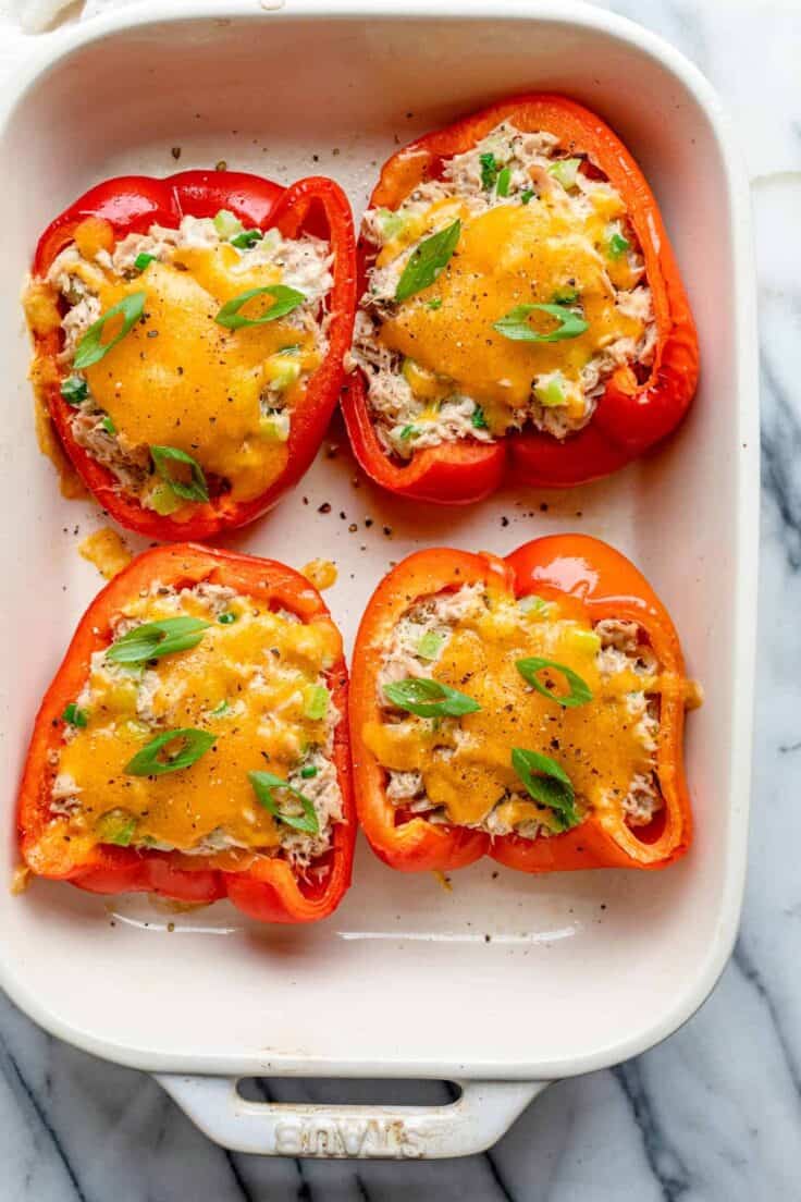 Tuna melt stuffed inside red bell peppers baked in the oven