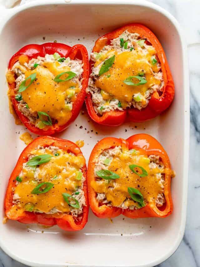 Tuna melt stuffed inside red bell peppers baked in the oven