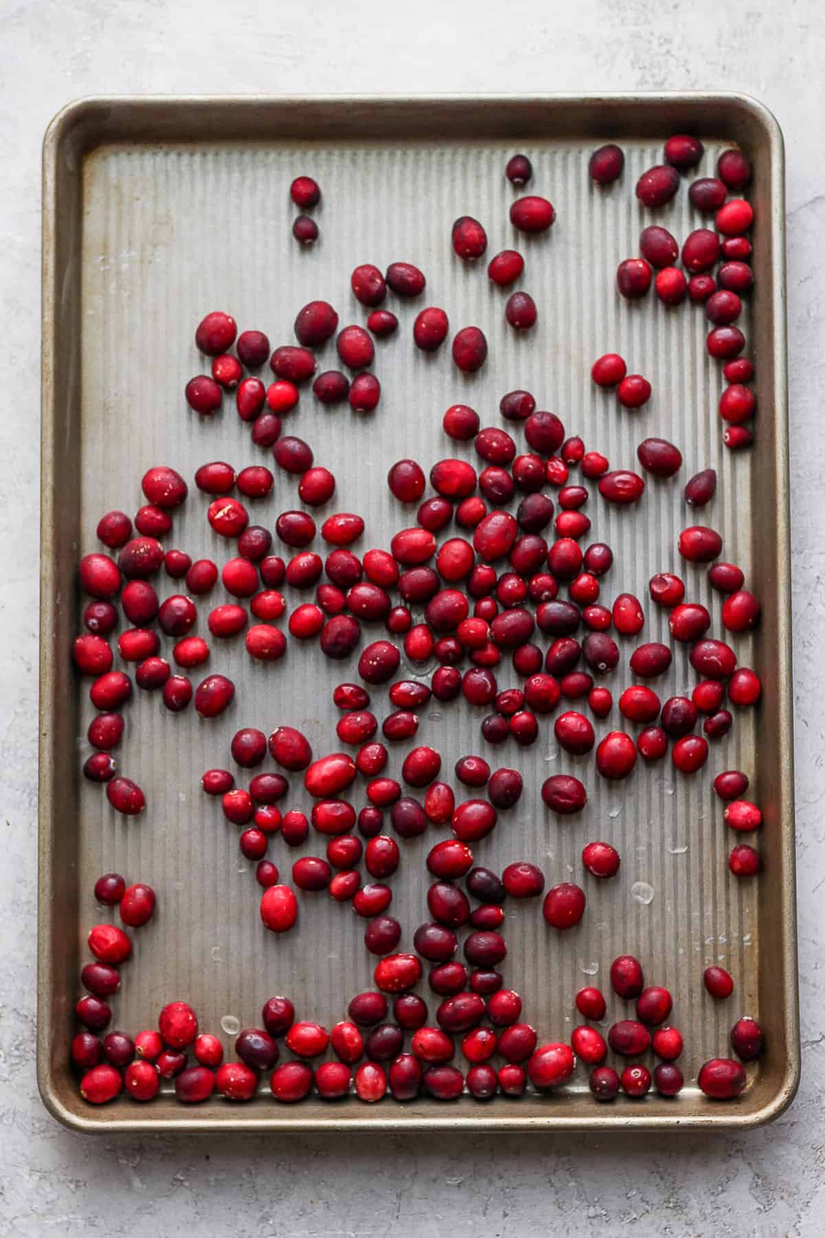 Cranberries on baking sheet after frozen