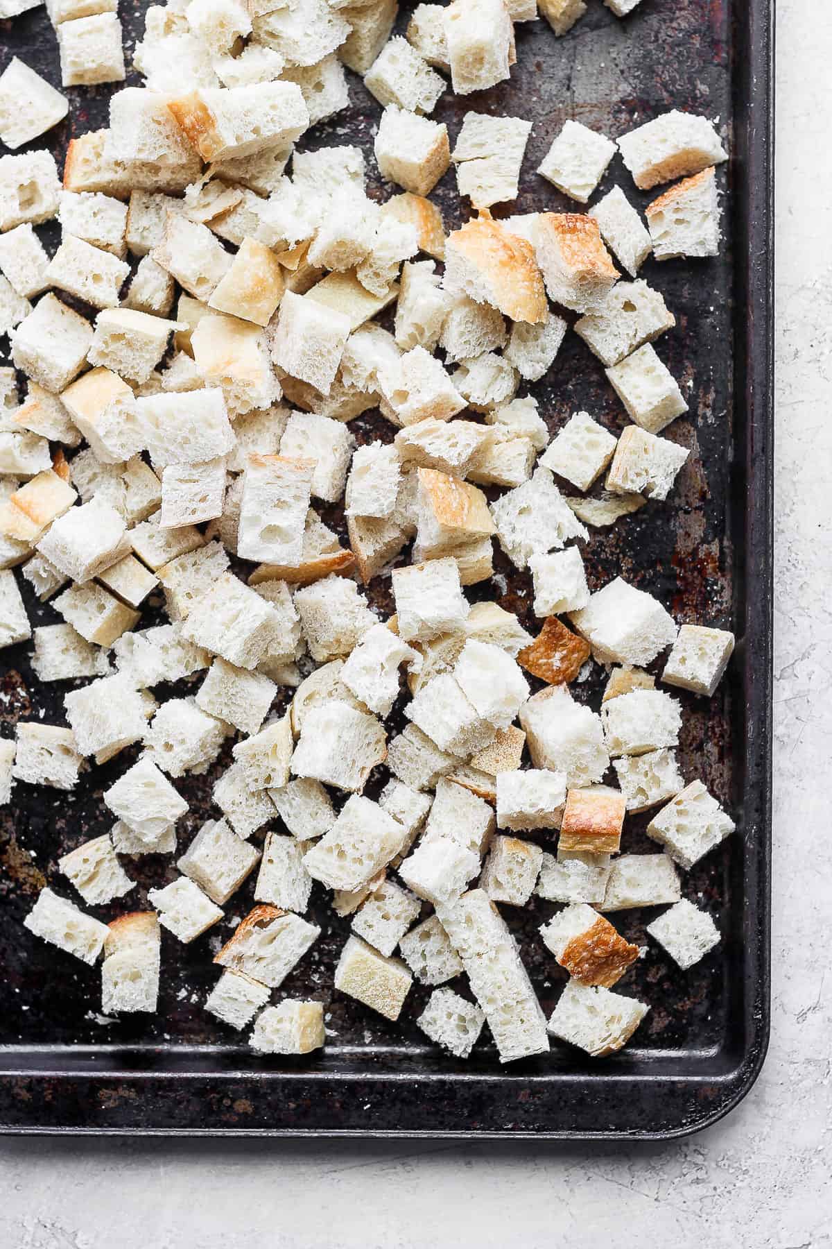 Bread cubes on a tray air drying