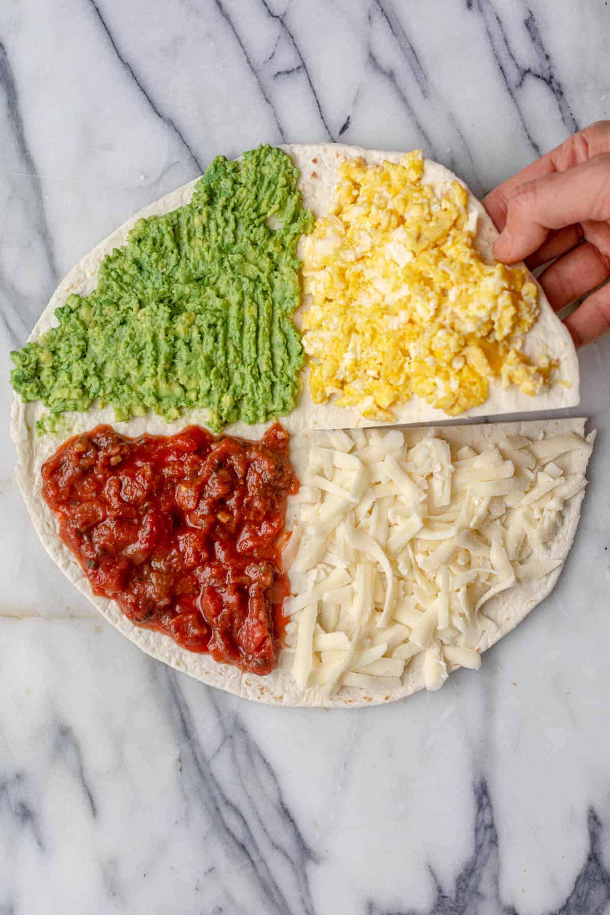 https://feelgoodfoodie.net/wp-content/uploads/2021/01/Breakfast-Tortilla-Wrap-4.jpg