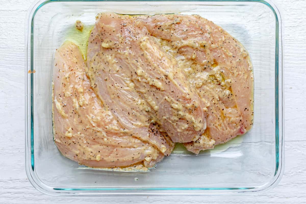 Chicken marinating in the dijon and garlic marinade