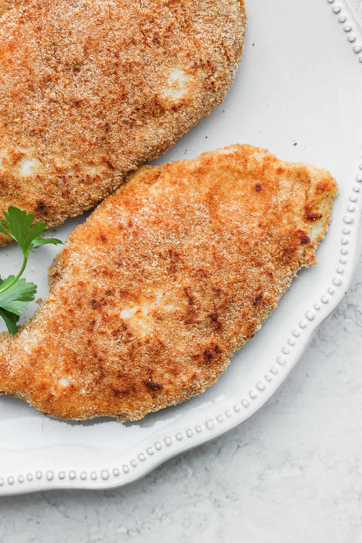 Close up of breaded chicken on a plate