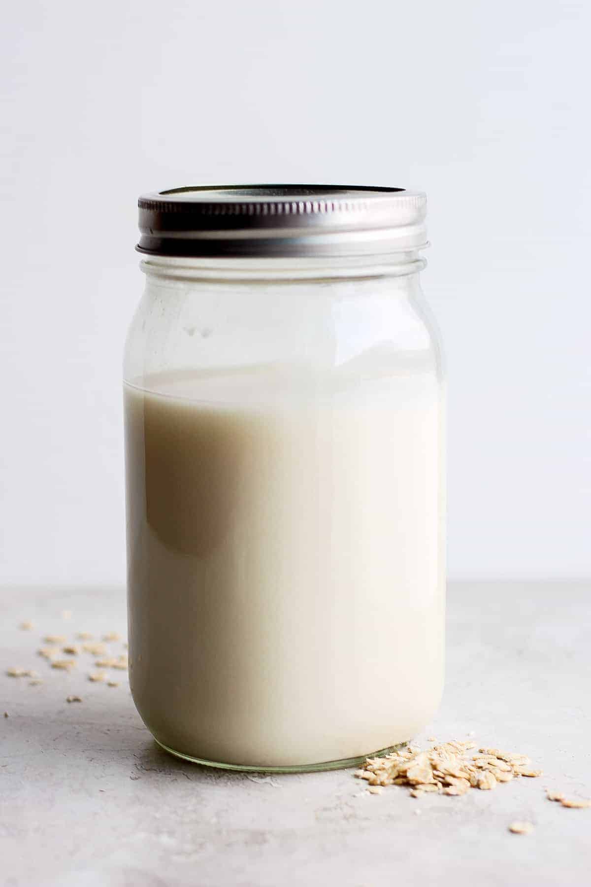 Homemade oat milk in a mason jar