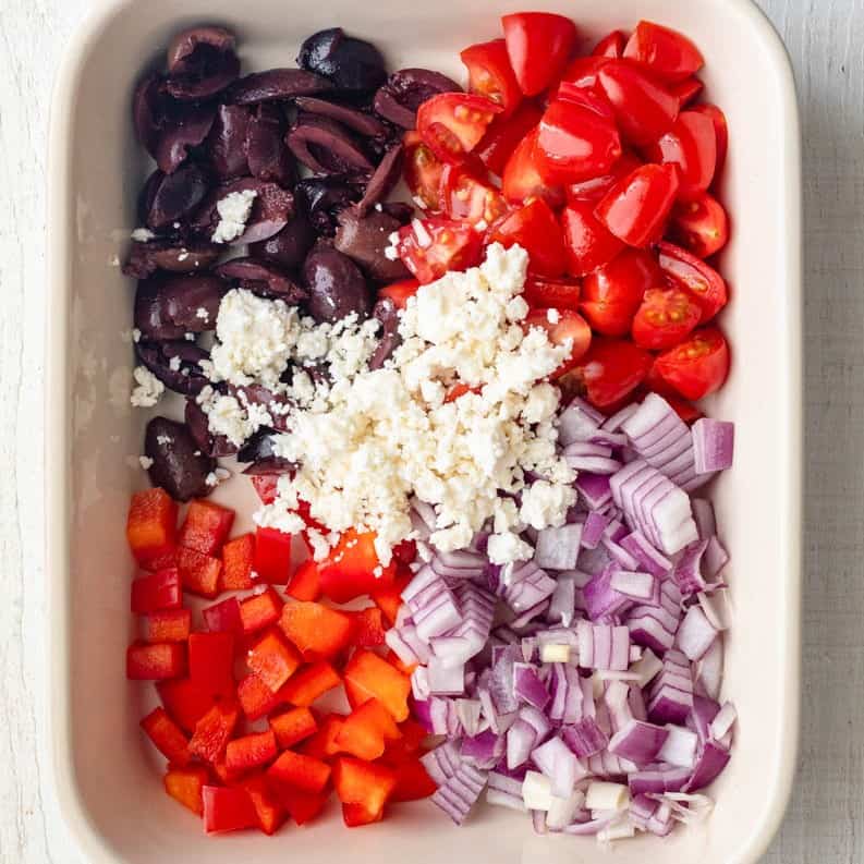 Feta on top of the veggies.