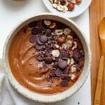 Chocolate hazelnut smoothie bowl with chopped hazelnuts and chocolate chips