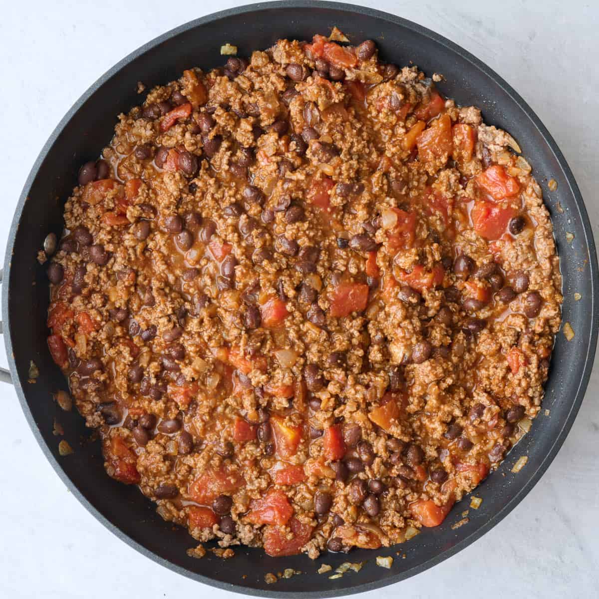 Mixture in skillet after cooking and combining all ingredients together.