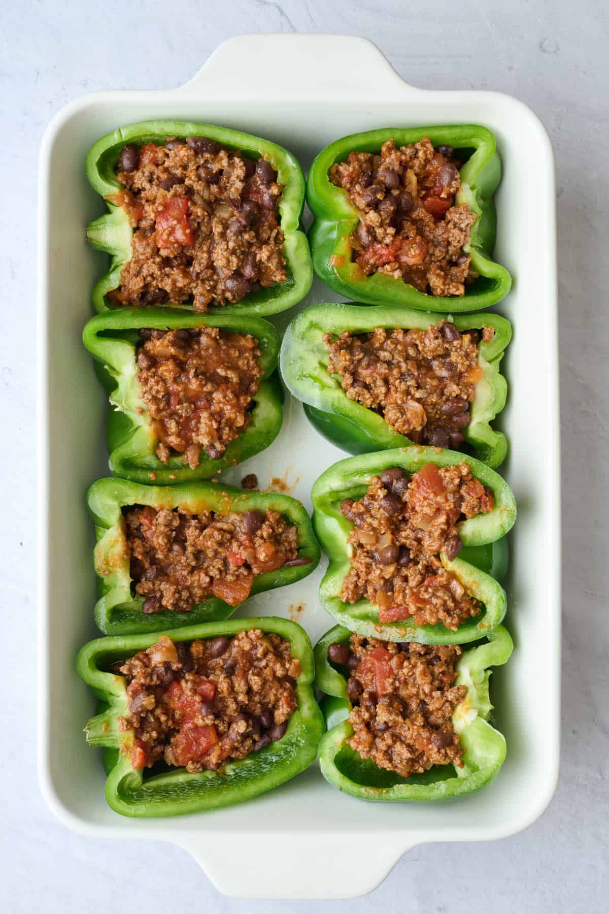 Beef mixture filling added to all of the halves.