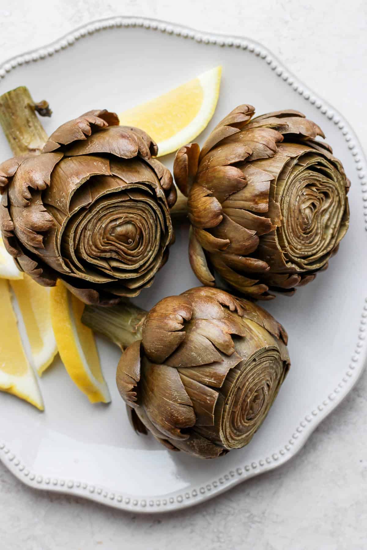 Final plated steamed artichokes