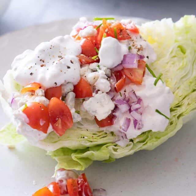 Close up shot of the wedge salad with the toppings
