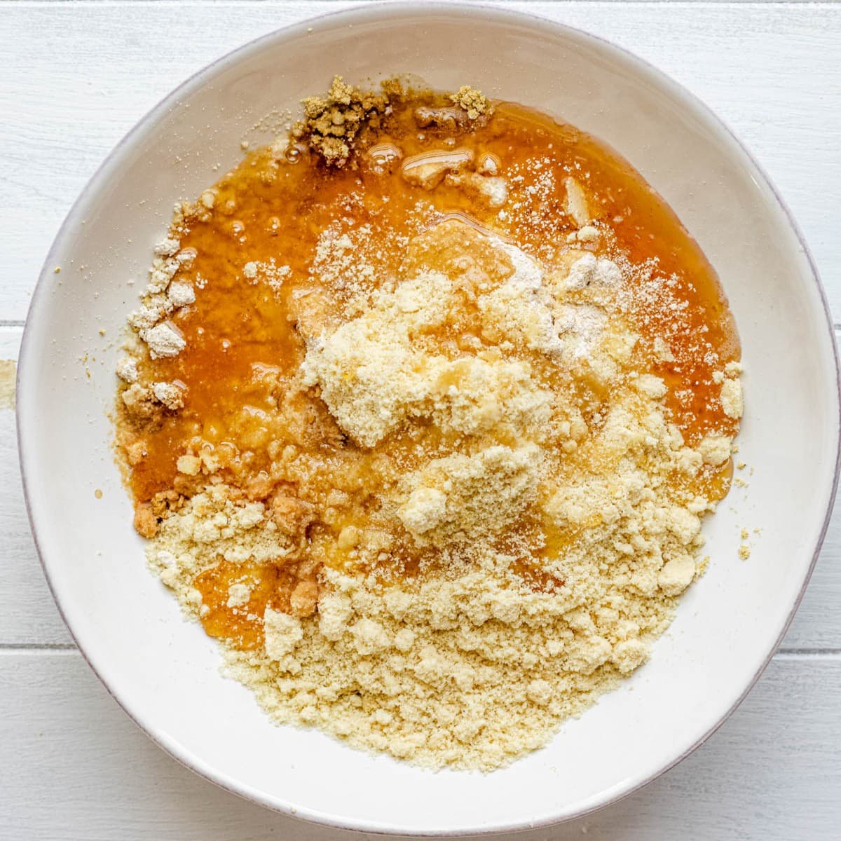 Place wet ingredients into a bowl.