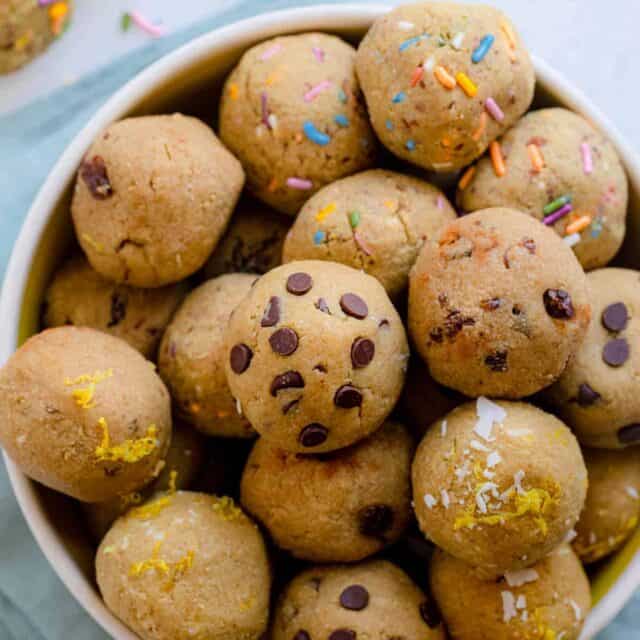 Large bowl of protein bites with two on the side