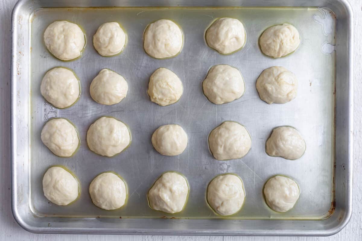 Dough balls on greased pan