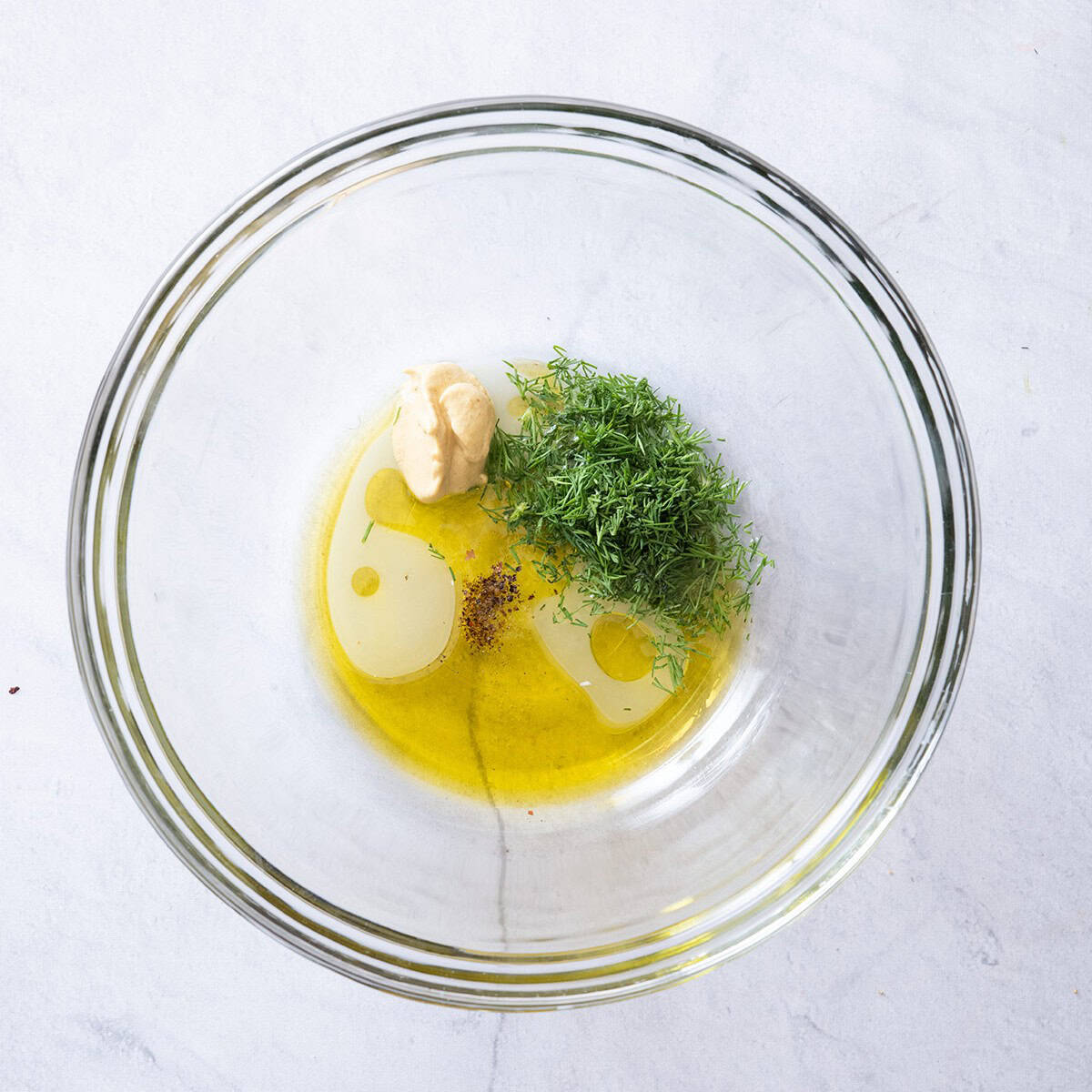 Add the dressing ingredients into a bowl.