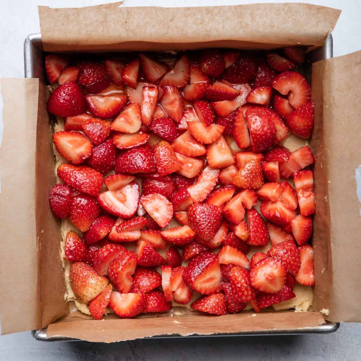 Based topped with strawberries.