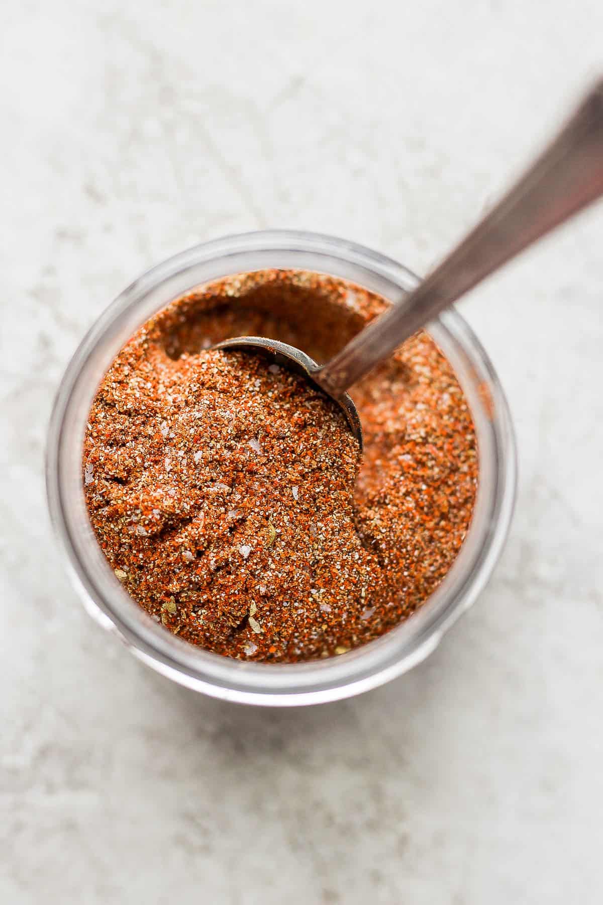 Top down view of the seasoning with spoon inside