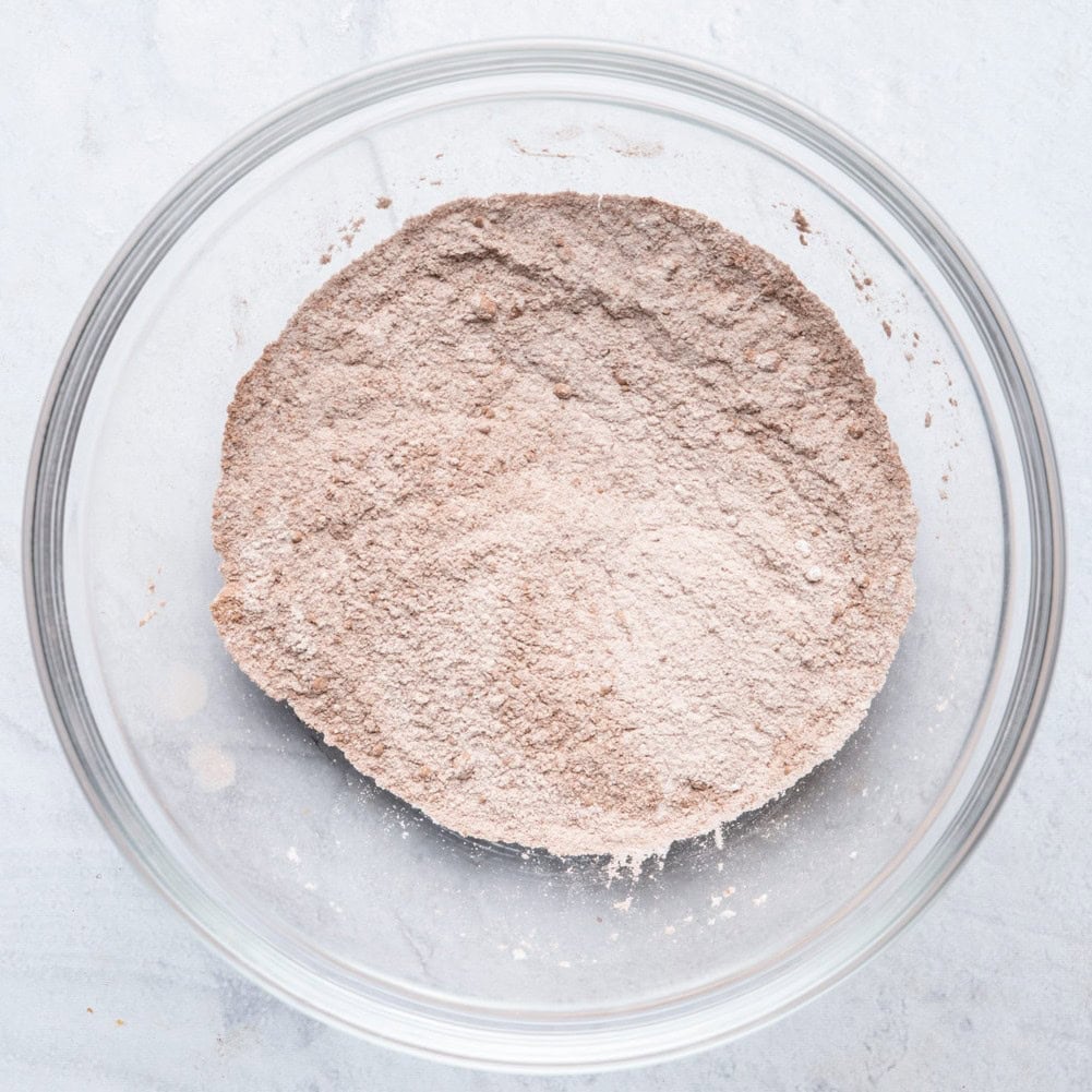 Dry ingredients for the chocolate mug cake in a bowl.