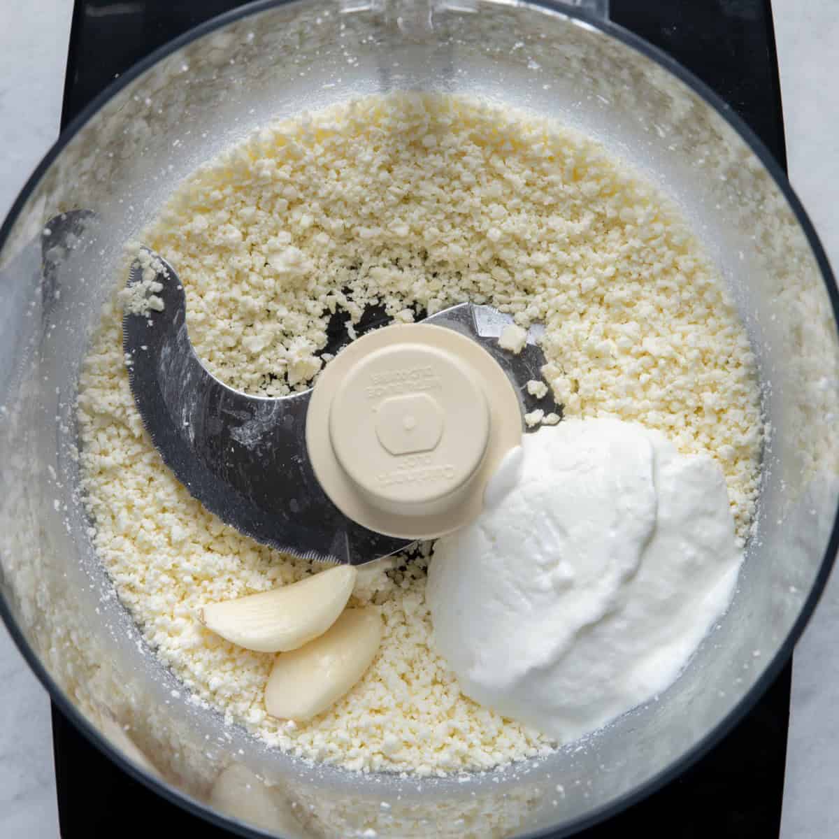 Ingredients for dip in small food processor.