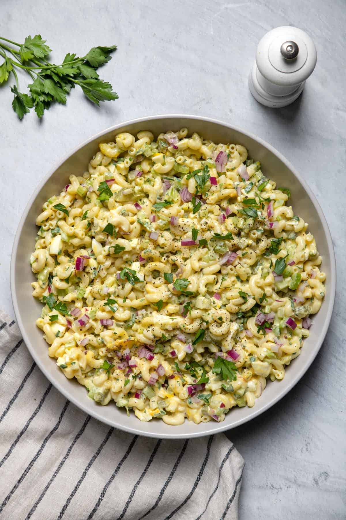 Large serving bowl of macaroni egg salad