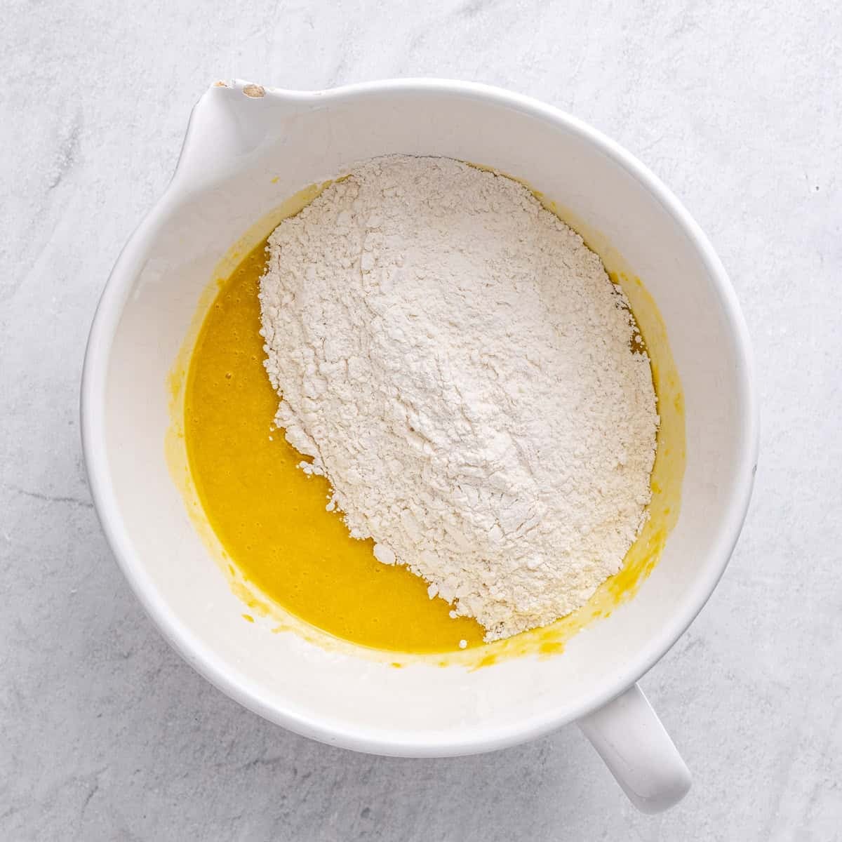 Eggs, oil, yogurt, and vanilla added after mixing with dry ingredients added.