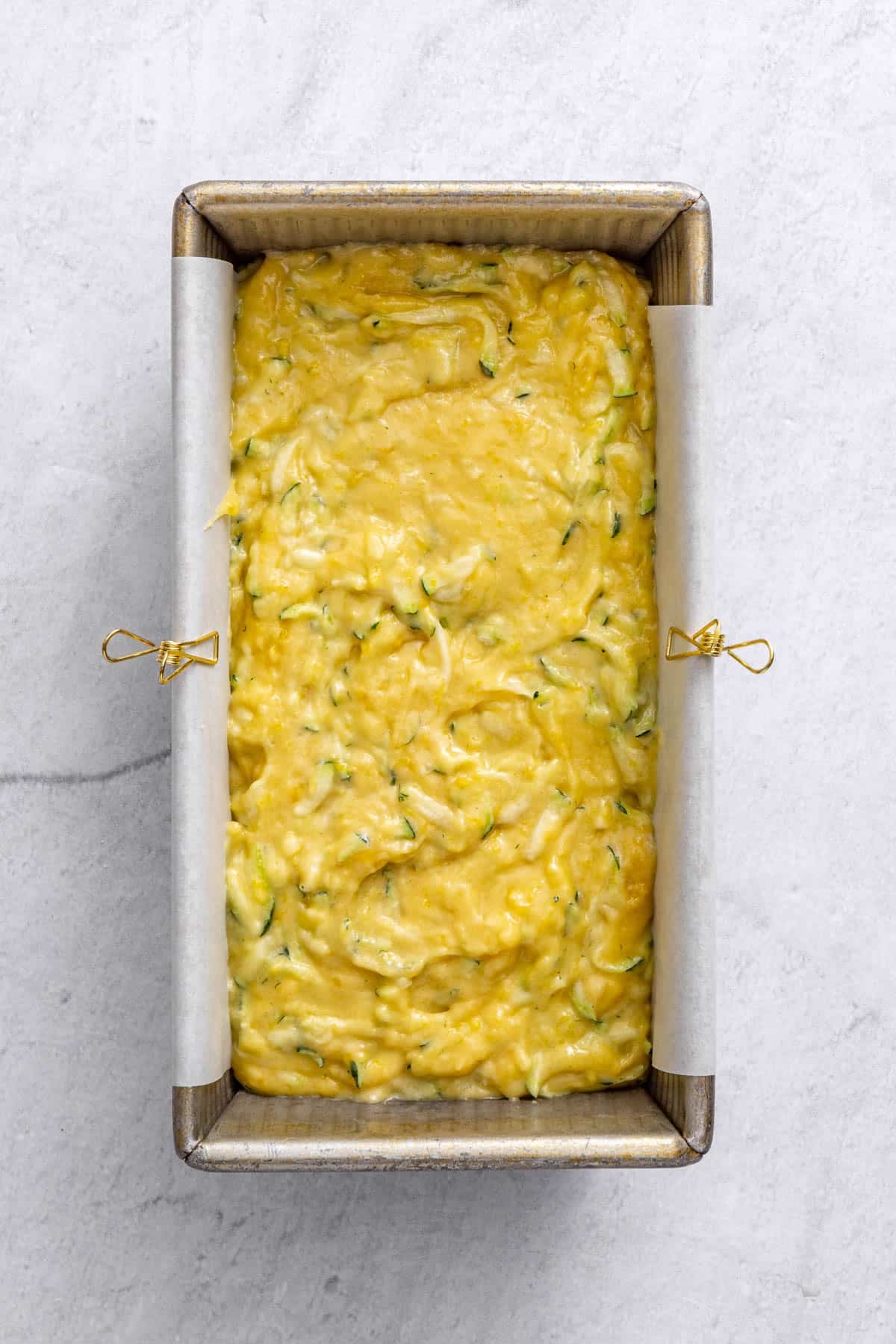 Batter added to prepared loaf pan before baking.