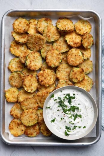 Air Fryer Zucchini chips served with dip