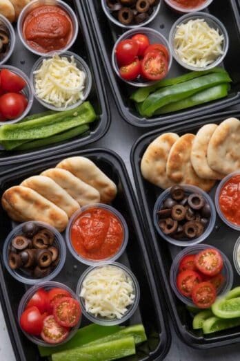 DIY Pizza lunchable meal prep with sauce, cheese, tomatoes, olives and peppers