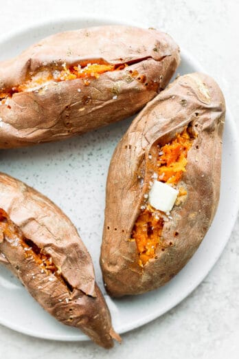 3 baked sweet potatoes with a dab of butter