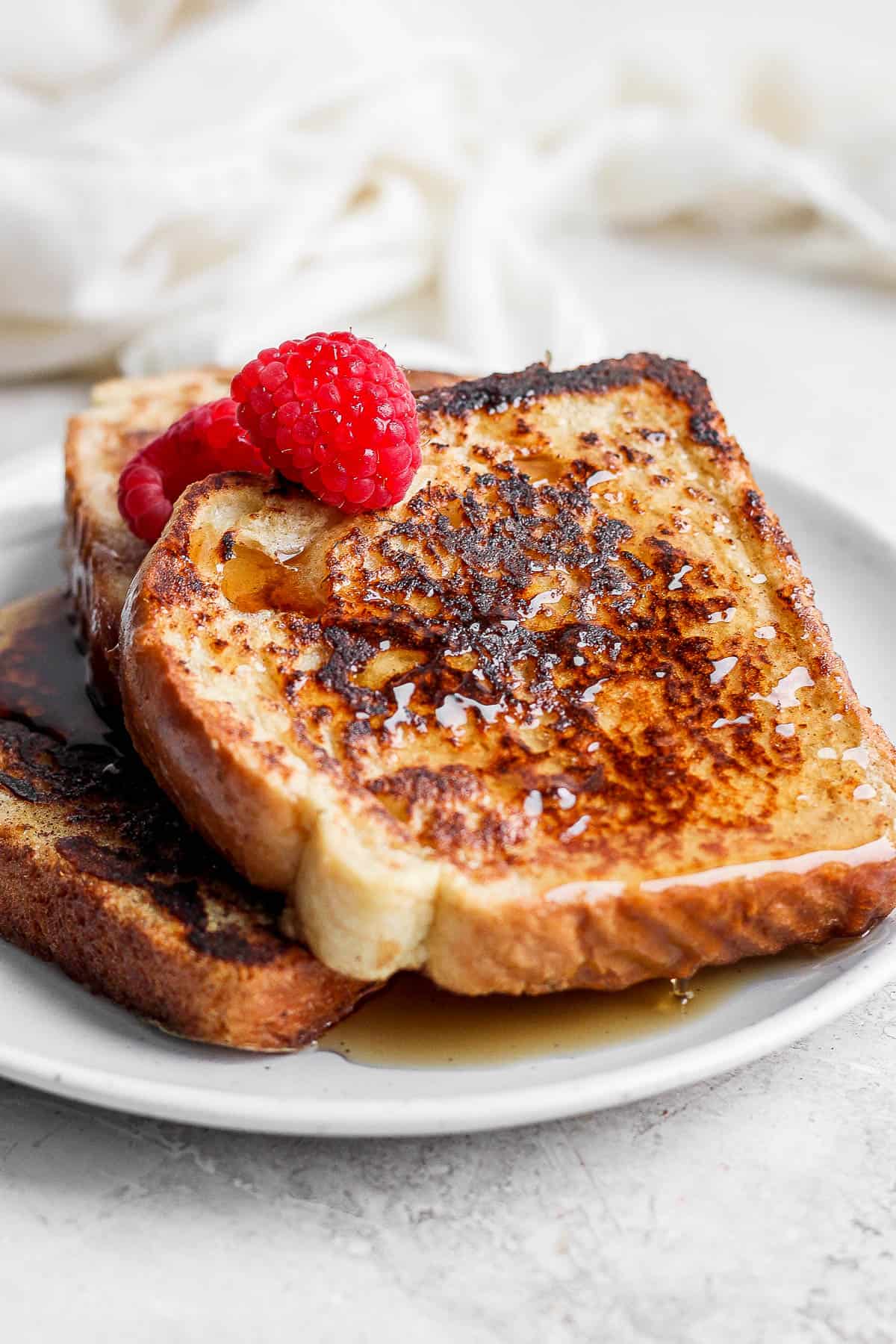 Close up of cooked french toast with berries