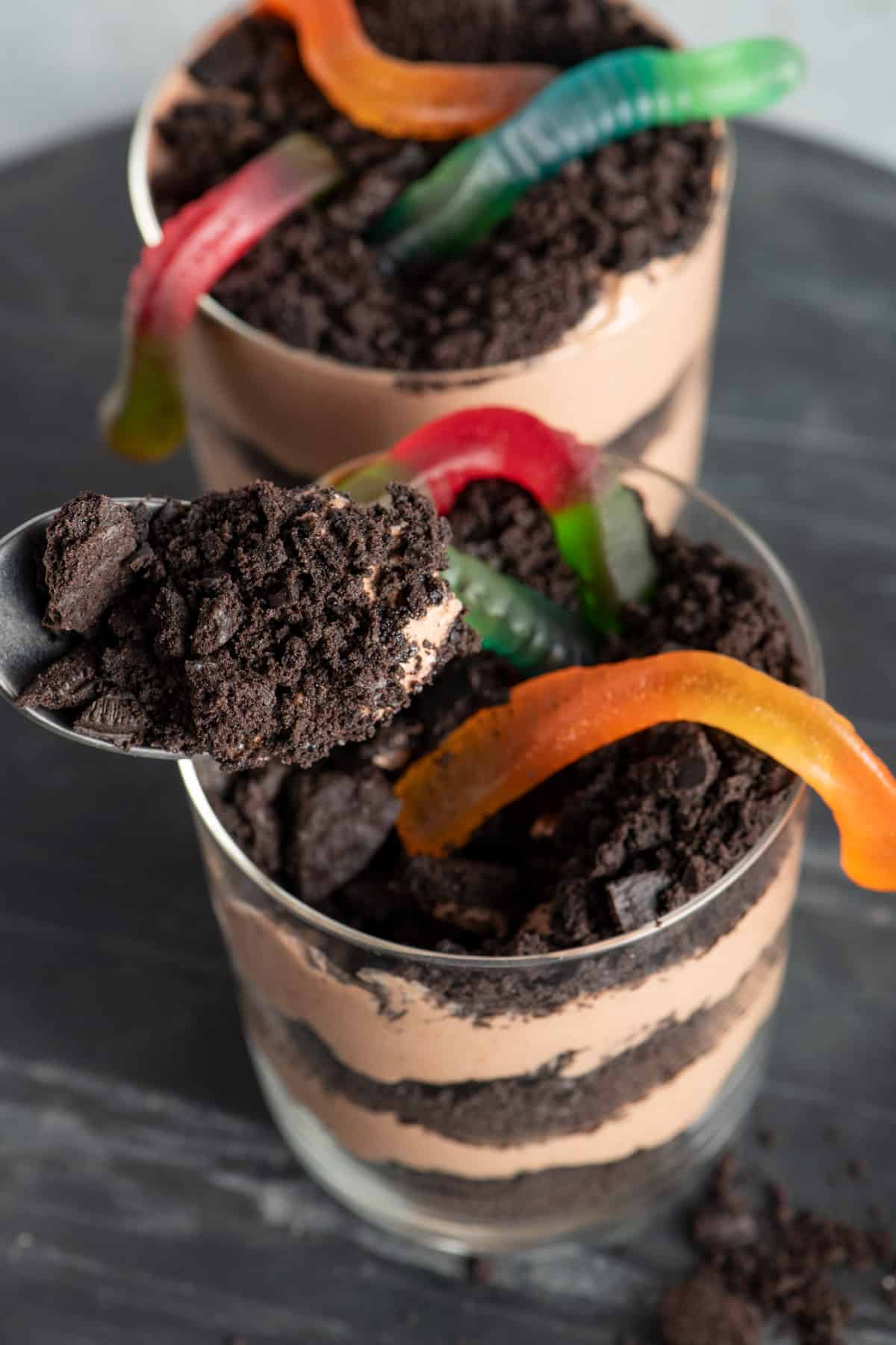 Overhead shot of dirt pudding cups with gummy worms