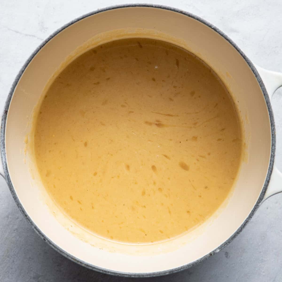 Turkey drippings in sauce pot.