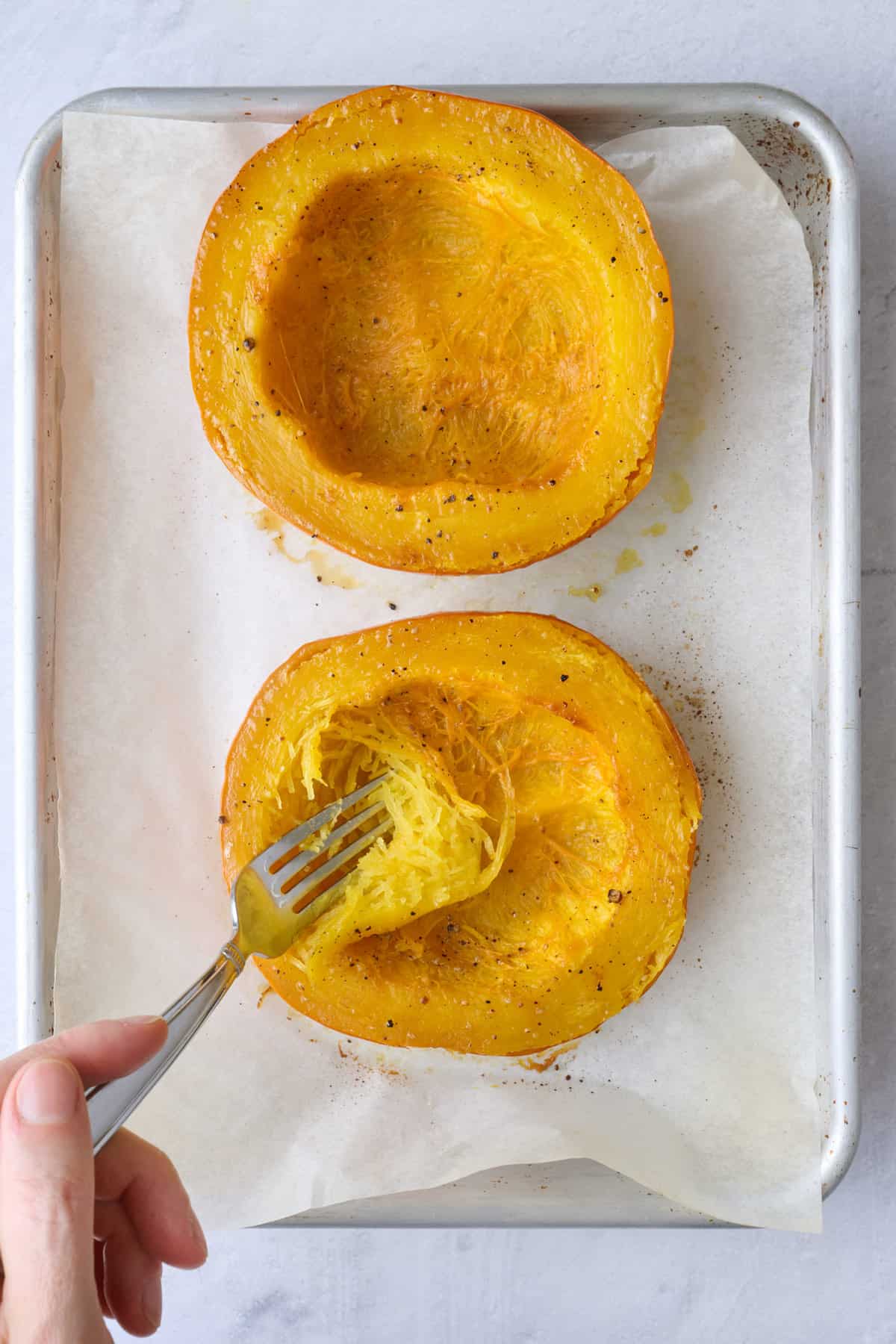 After roasting, flipped over with a fork piercing to show doneness.