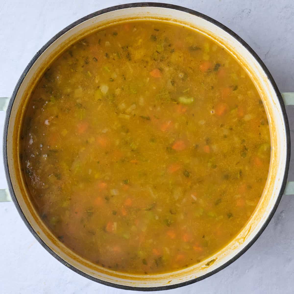After cooking all of the soup ingredients together.