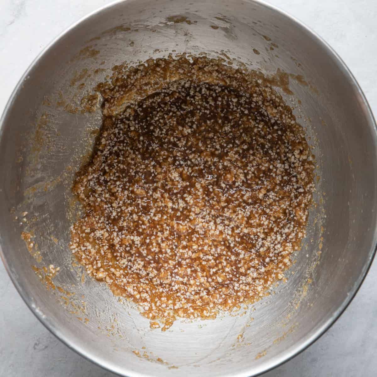Sugar, applesauce and coconut oil blended.
