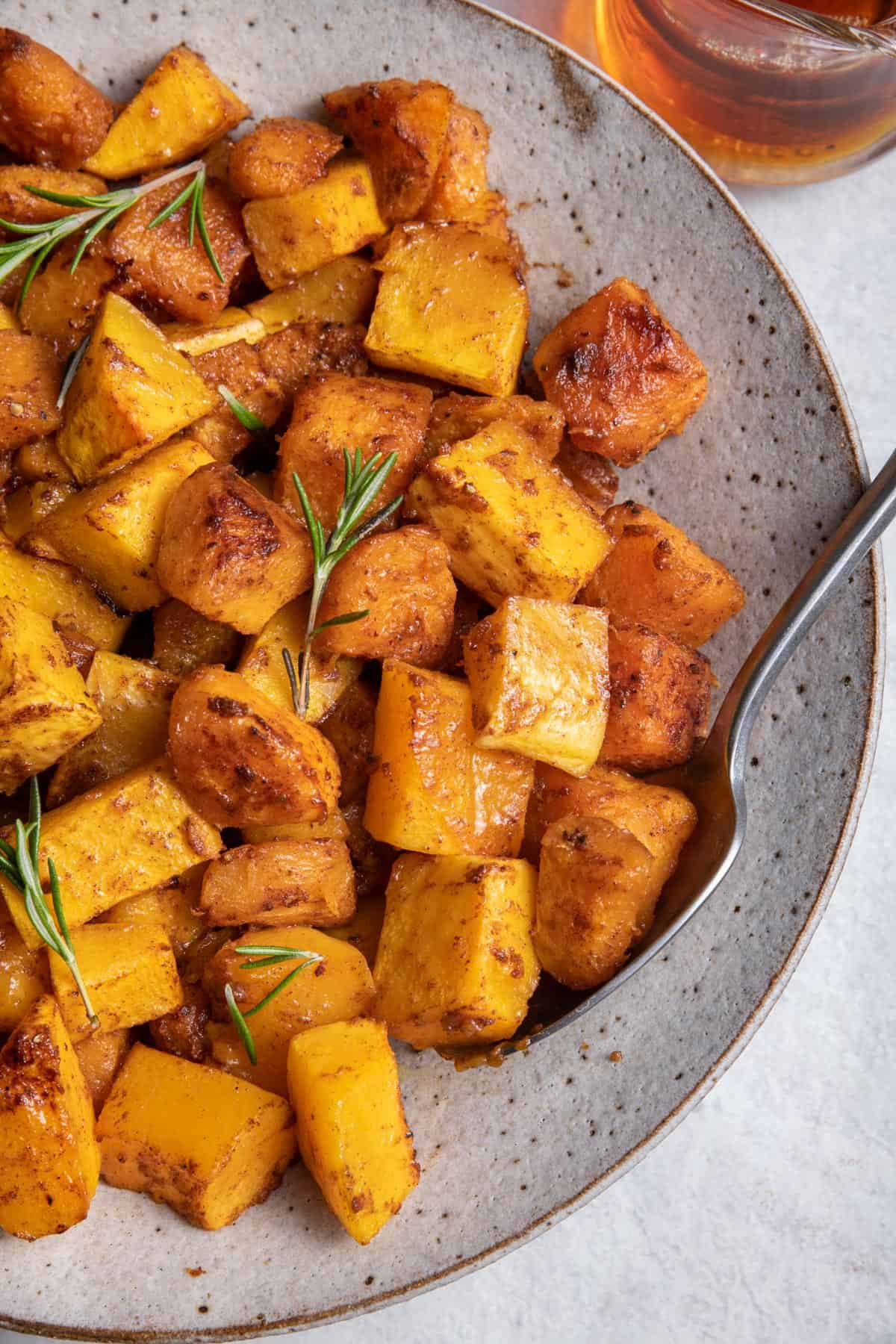 Close up shot of cinnamon roasted butternut squash cubes