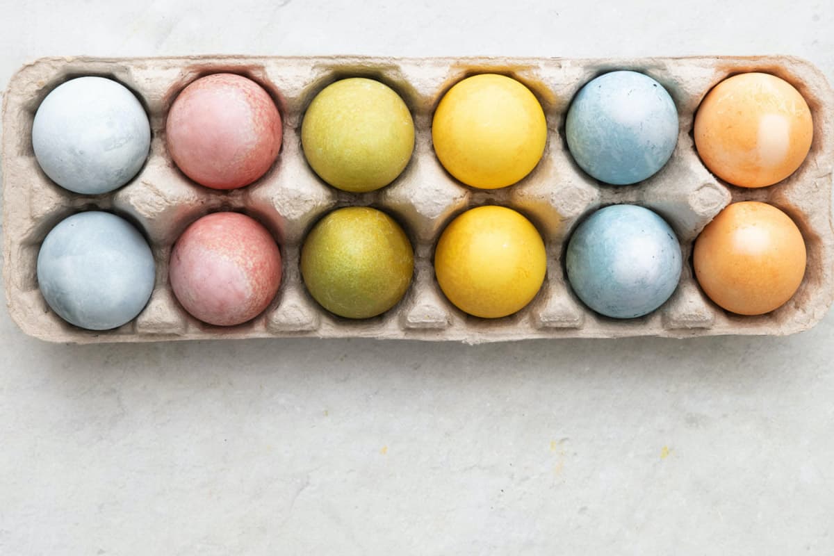 Egg carton of naturally dyed easter eggs